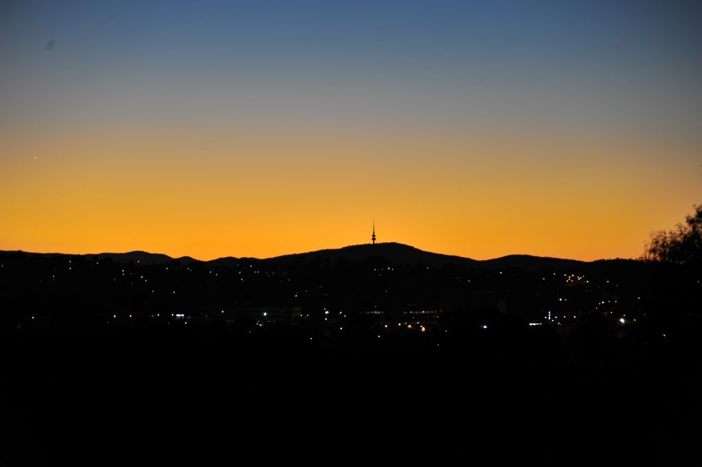 Backdrop of Canberra at sunset